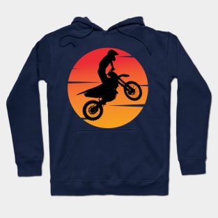 motocross silhouette jumping in front of the afternoon sun Hoodie